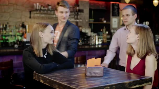 Company of young people is meeting in the bar — Stock Video