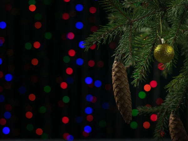 보케의 배경에 콘이 달린 크리스마스 나무가지. 선택적 집중입니다. 크리스마스와 새해 기념행사. — 스톡 사진