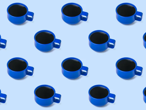 Seamless pattern of blue coffee cups with black coffee. A popular invigorating drink.