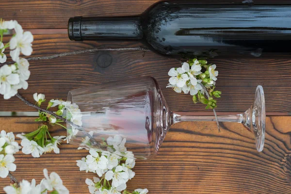 Glass Bottle Red Wine Branches Cherry Tree Wooden Table Wine — Foto de Stock