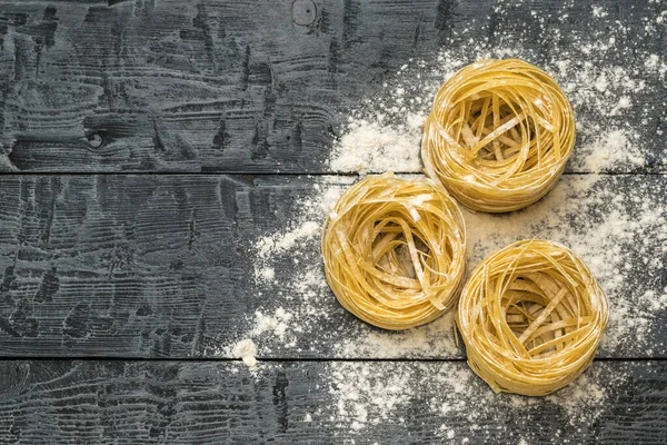 Flour Pasta Black Wooden Table Space Text Ingredients Making Pasta — Φωτογραφία Αρχείου