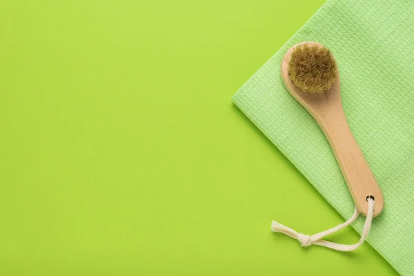 Small Massage Brush Green Towel Green Background Tool Body Care — Stock Photo, Image