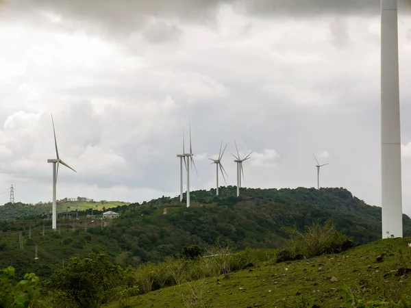 Wind Turbines Green Hilly Terrain Bright Blue Sky — Stock Photo, Image