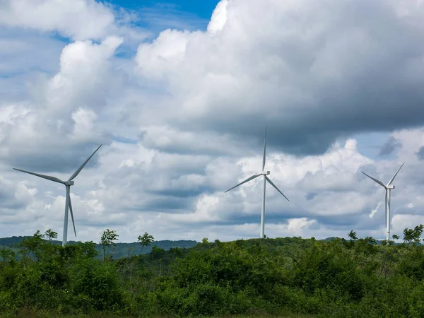 Wind Turbines Green Hilly Terrain Bright Blue Sky — Stock Photo, Image