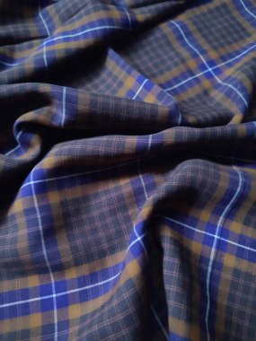 blue and brown checkered striped fabric pattern and background