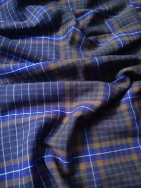 blue and brown checkered striped fabric pattern and background