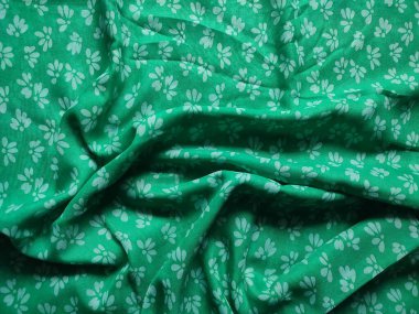 white floral fabric background and pattern and pleated lines with green base color