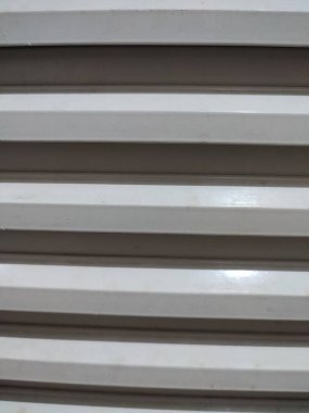 Hava delikleri gri. Arz ve egzoz havalandırma sistemleri. Klima elementleri.