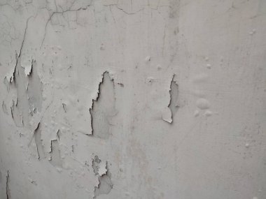 Desen, doku, beyaz duvar arkaplanı soyuluyor, kirli, çatlak ve hasarlı