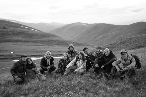 group of young people in the mountains