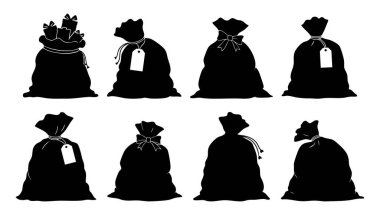 Hazır. Noel Baba hediye çantalarının siyah silueti beyaz arka planda izole edilmiş şenlik kurdele detaylarıyla dolu. Tatil konsepti, hediye paketi, Noel Baba, hediyeler, dekor, minimalist sanat.