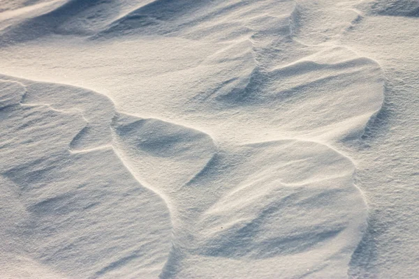 Фон снежные волны на закате ветра — стоковое фото