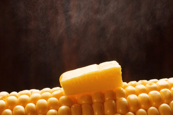 Butter on boiled corn — Stock Photo, Image