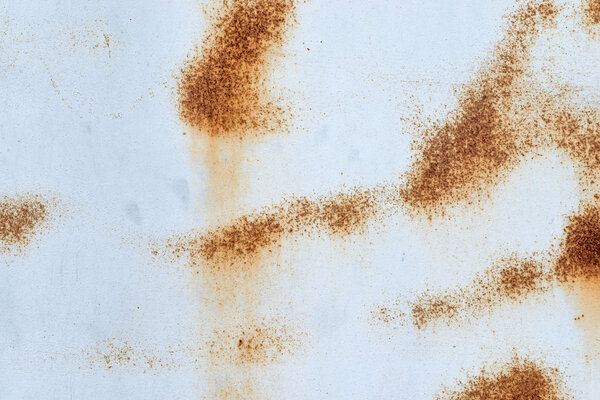 Rust on white metal background