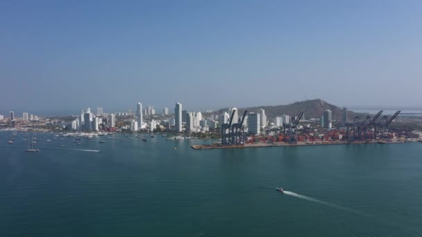 The Cartagena cargo harbor with city panorama aerial view. — Stock Video