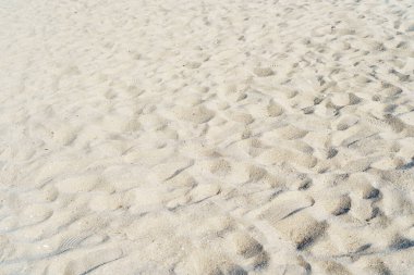 Yakın plan kum arka plan yaz güneşinde yumuşak doku.