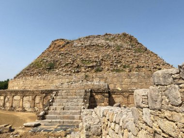 Ancient Dharmarajika stupa and stone stairway in Taxila ruins