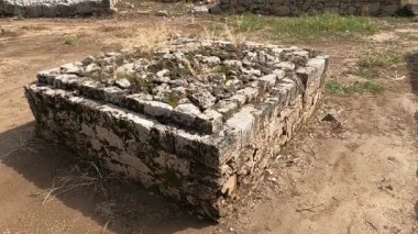 Small stupa built in front of Dharmarajika Stupa symbolizing fulfillment of wishes and Buddhist devotion in ancient Gandhara heritage site Taxila