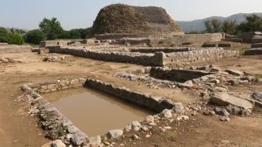 Dharmarajika Stupa compound view showing sacred pond once used by Buddhist monks for ritual purification in ancient Taxila ruins