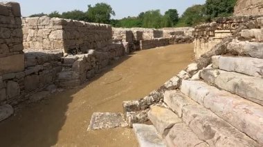 Dharmarajika Stupa circular pathway once used by Buddhist devotees for ritual walking symbolizing spiritual devotion and Gandhara heritage in ancient Taxila Pakistan