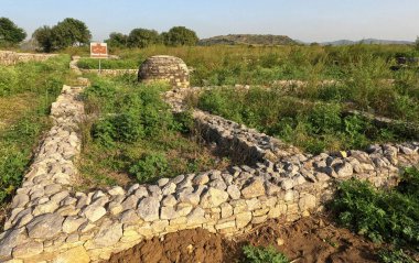 Small round votive stupa built by devotees after wish fulfillment in ancient Sirkap Taxila Pakistan showing Gandhara Buddhist heritage Taxila Pakistan October 08 2025