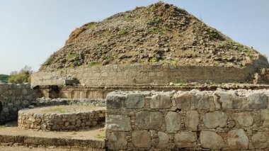 Majestic Dharmarajika Stupa panoramic landscape showcasing UNESCO World Heritage Buddhist monument in Taxila