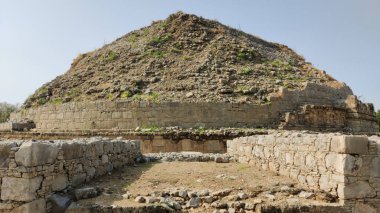 Panoramic view of Dharmarajika Stupa with ancient Buddhist ruins in Taxila