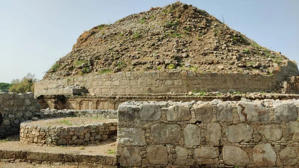 Majestic Dharmarajika Stupa panoramic landscape showcasing UNESCO World Heritage Buddhist monument in Taxila