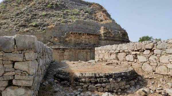 Ancient small stupas and monastic rooms surrounding Dharmarajika Stupa showcasing Gandhara Buddhist heritage