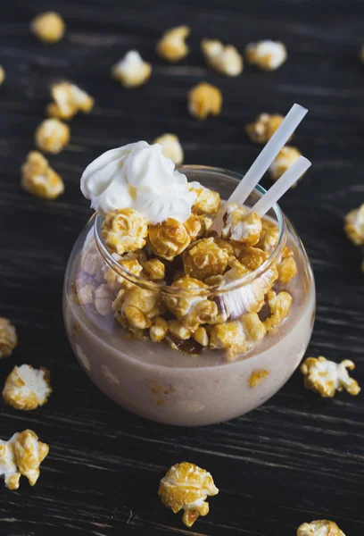 Cup of cacao with caramel popcorn