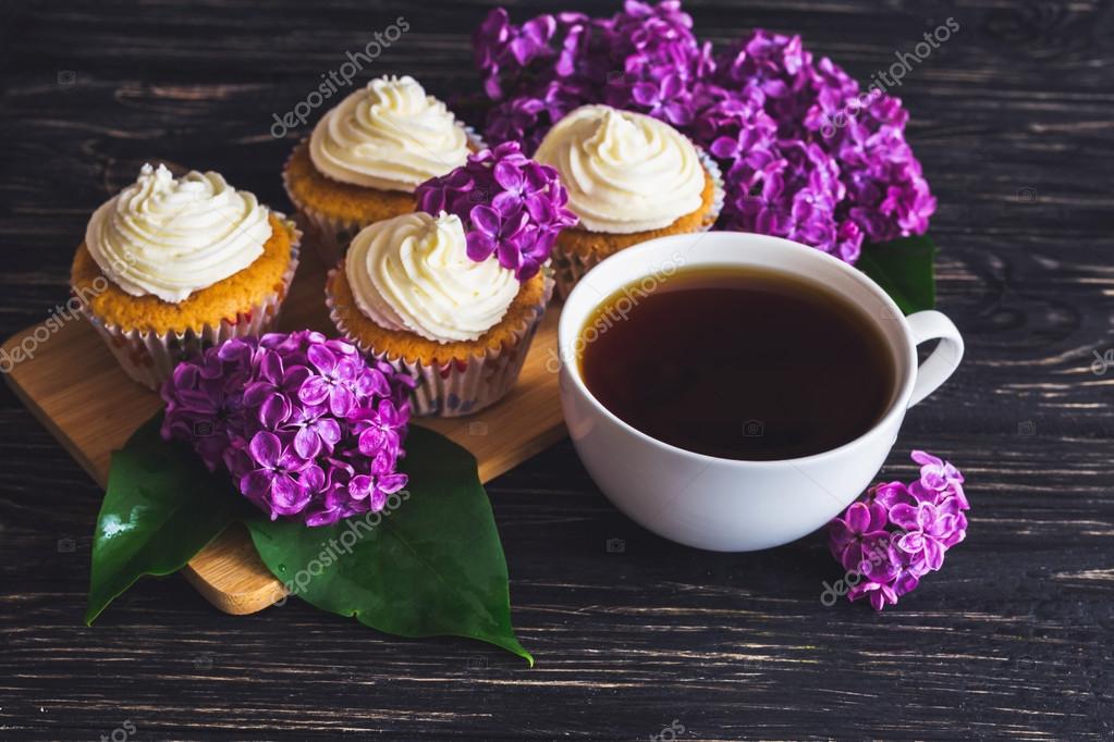 depositphotos_109876502-stock-photo-cupcakes-with-cream-coffee-and.jpg