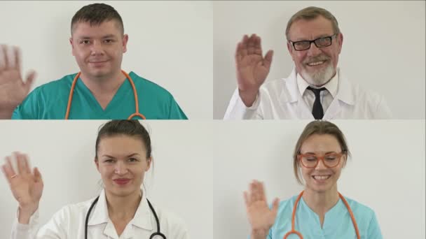 Group video conference of medicine workers share ideas remotely. Doctors welcome each other. — Stock Video