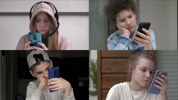 Fernstudium. Die Schüler schauen in Erwartung des Unterrichtsbeginns auf die Bildschirme ihrer Mobiltelefone. — Stockvideo