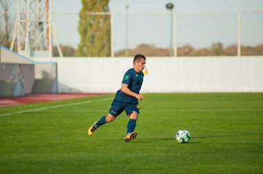 KHARKIV, UKRAINE - 9 Ekim 2020: Vladimir Tanchuk Profesyonel Lig FC Metal FC Energia 'ya karşı oynadığı futbol maçı sırasında
