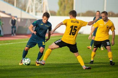 KHARKIV, UKRAINE - 9 Ekim 2020: Vladimir Tanchuk Profesyonel Lig FC Metal FC Energia 'ya karşı oynadığı futbol maçı sırasında