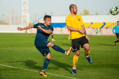 KHARKIV, UKRAINE - 9 Ekim 2020: Vladimir Tanchuk Profesyonel Lig FC Metal FC Energia 'ya karşı oynadığı futbol maçı sırasında