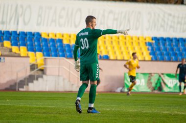KHARKIV, UKRAINE - 9 Ekim 2020: Sergey Dvornik FC Energia 'nın kalecisi Profesyonel Lig - FC Metal maçında