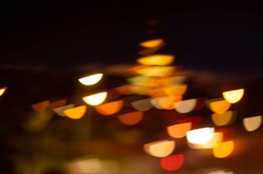 Yürüyen caddenin arka planı için Blured Lights Bokeh