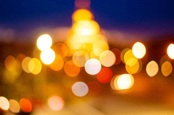 Blured lighhts bokeh for background from walking street