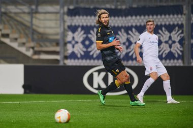 KYIV, UKRAINE - 4 Kasım 2020: Dmytro Chygrynskiy. FC ZORYA LUHANSK ve FC AEK ATHENS arasında oynanan UEFA Avrupa Ligi futbol karşılaşması