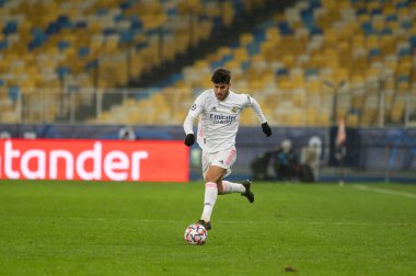 KYIV, UKRAINE 1 Aralık 2020 Marco Asensio. UEFA Şampiyonlar Ligi B Grubunun futbol maçı FC Shakhtar Donetsk - Real Madrid FC 