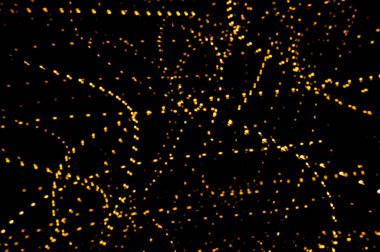 Altın ışık yollarının arka planı. Işık izleri. Boşluğu kopyala. 