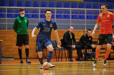 KHARKIV, UKRAINE - 24 Ocak 2021 Ukrayna ExtraLeague Viva Cup Monolit Donbass Energo Trading 'e karşı futsal maçı