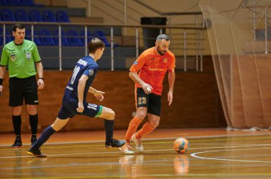 KHARKIV, UKRAINE - 24 Ocak 2021 Ukrayna ExtraLeague Viva Cup Monolit Donbass Energo Trading 'e karşı futsal maçı