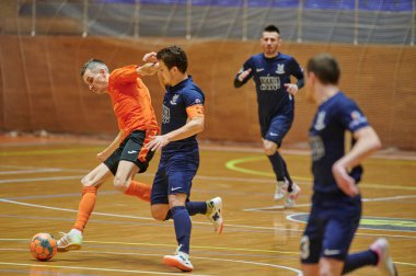 KHARKIV, UKRAINE - 24 Ocak 2021 Ukrayna ExtraLeague Viva Cup Monolit Donbass Energo Trading 'e karşı futsal maçı