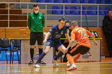 KHARKIV, UKRAINE - 24 Ocak 2021 Ukrayna ExtraLeague Viva Cup Monolit Donbass Energo Trading 'e karşı futsal maçı