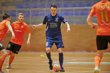 KHARKIV, UKRAINE - 24 Ocak 2021 Ukrayna ExtraLeague Viva Cup Monolit Donbass Energo Trading 'e karşı futsal maçı