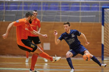 KHARKIV, UKRAINE - 24 Ocak 2021 Ukrayna ExtraLeague Viva Cup Monolit Donbass Energo Trading 'e karşı futsal maçı