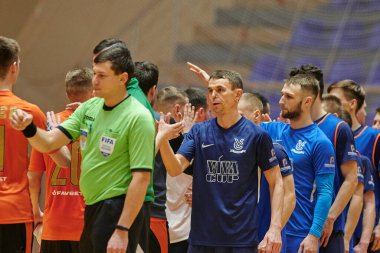 KHARKIV, UKRAINE - 24 Ocak 2021 Ukrayna ExtraLeague Viva Cup Monolit Donbass Energo Trading 'e karşı futsal maçı