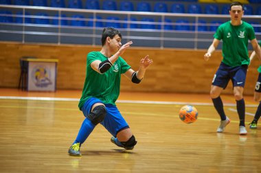 KHARKIV, UKRAINE - 24 Ocak 2021 Ukrayna ExtraLeague Viva Cup Monolit Donbass Energo Trading 'e karşı futsal maçı